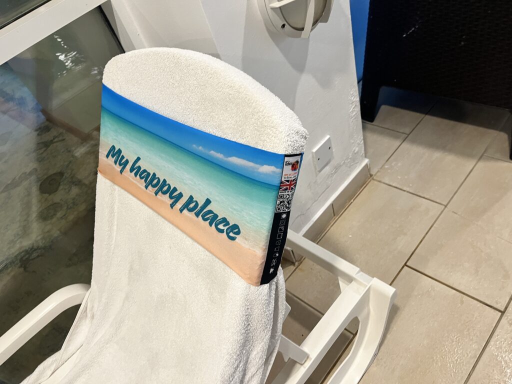 My Happy Place tcboo sun lounger towel band securing a towel to the backrest