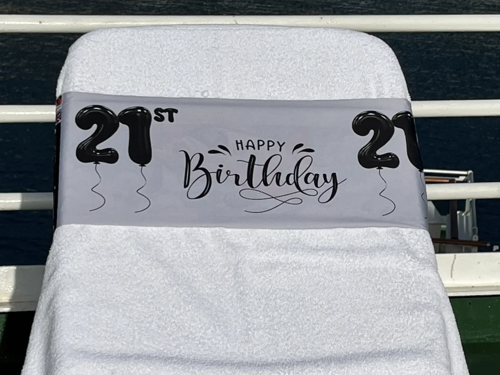 21st birthday tcboo sun lounger towel band securing a beach towel