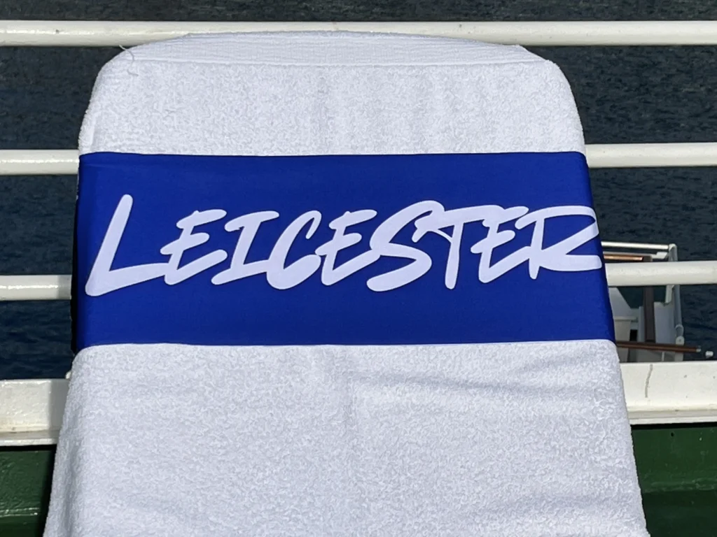 Leicester city tcboo sun lounger towel band securing a beach towel