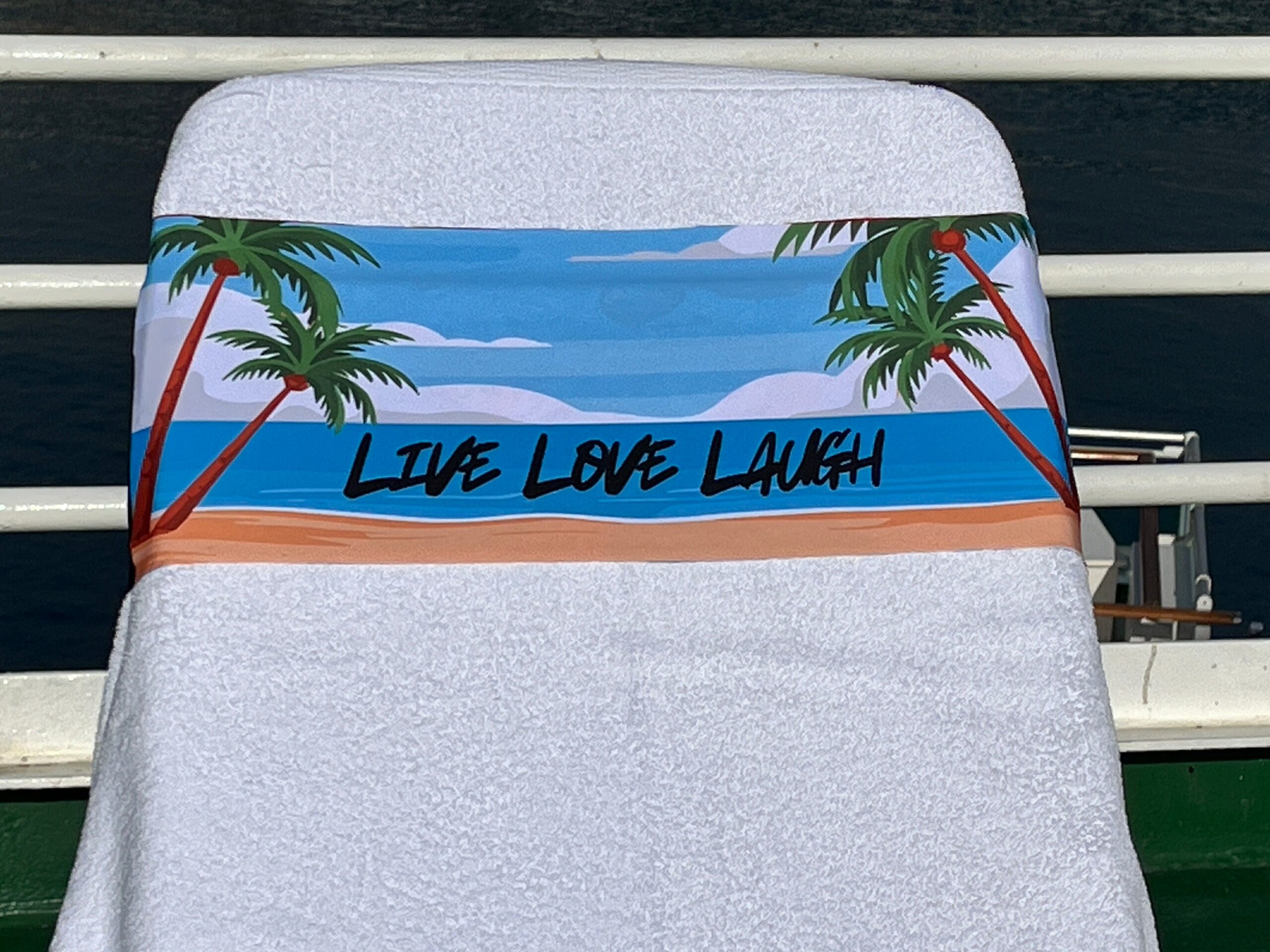 Live Love Laugh design on a reusable tcboo sun lounger band