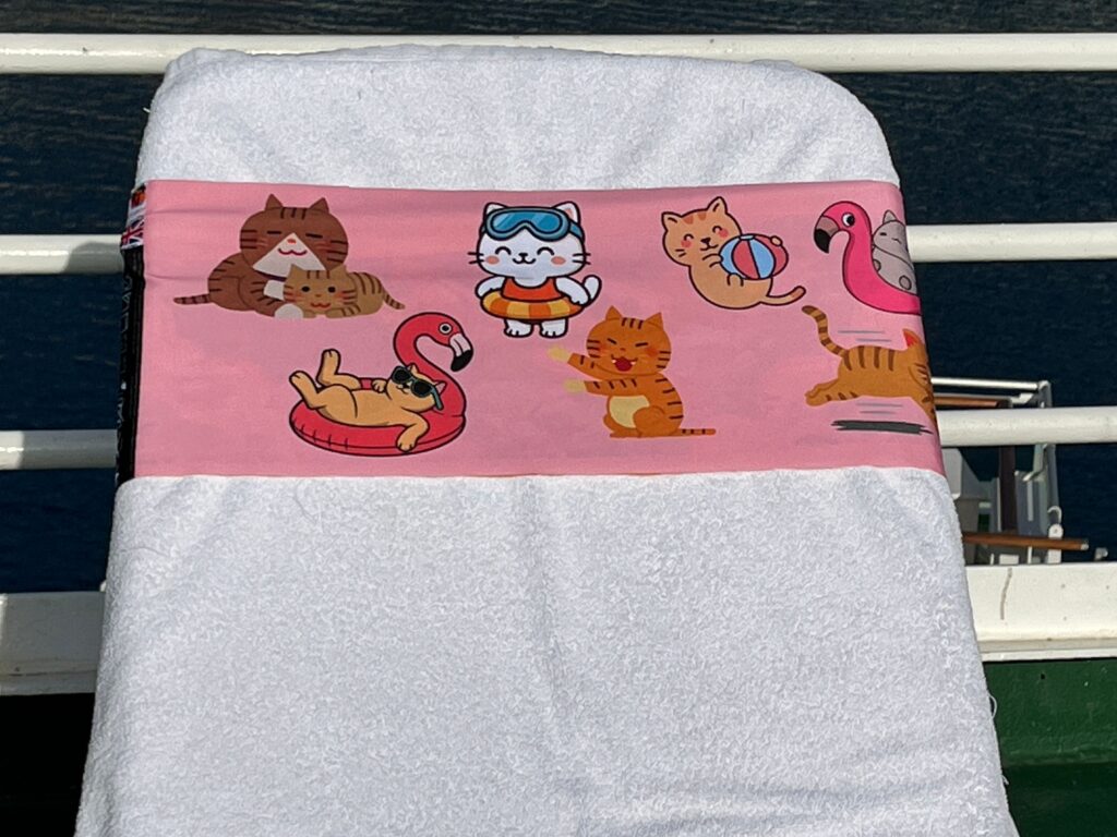 Pussy Galore pink tcboo sun lounger band with illustrated cat characters