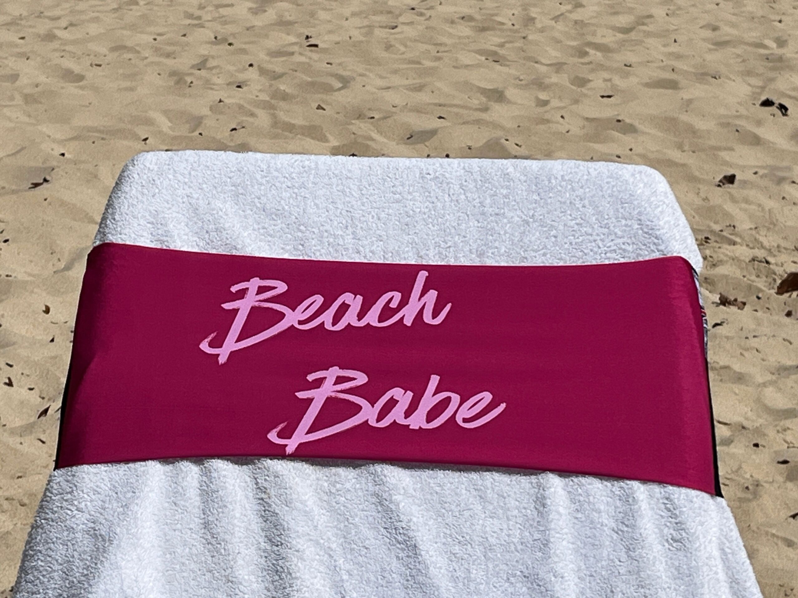 Beach Babe design on a reusable tcboo sun lounger band