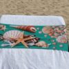 Seashells design on a reusable tcboo sun lounger band