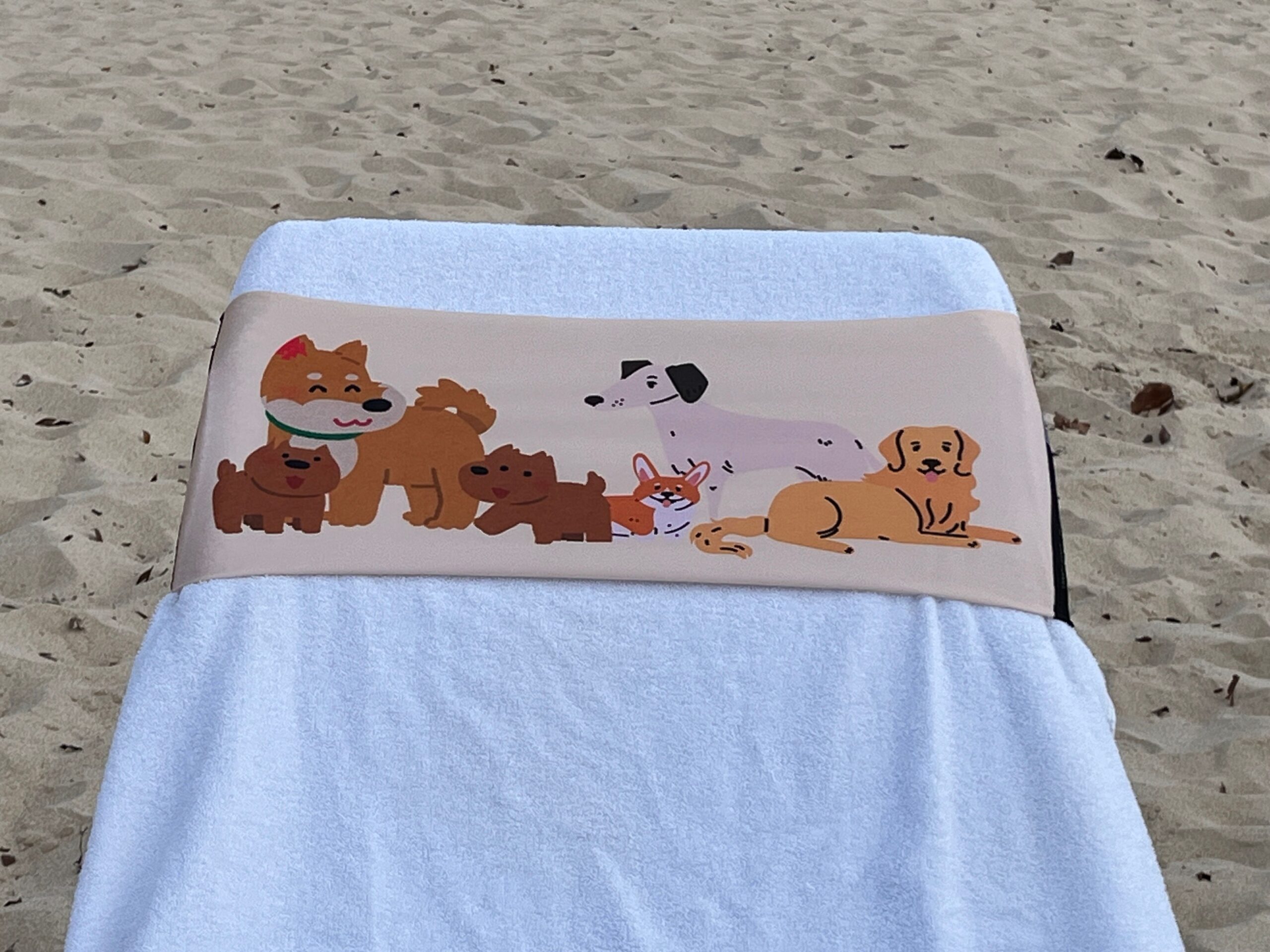 Dog Tired design on a reusable tcboo sun lounger band