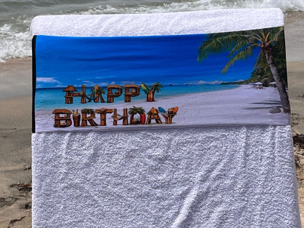 Art Happy Birthday Paradise design on a reusable tcboo sun lounger band