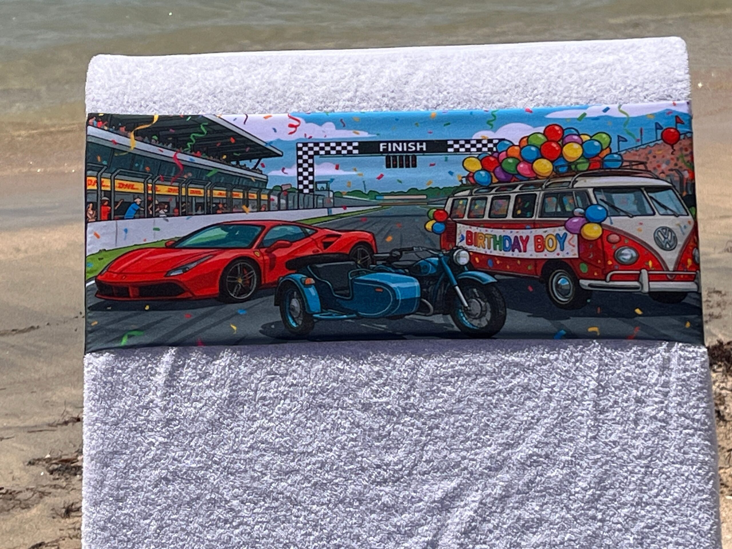 Racetrack Birthday Boy design on a reusable tcboo sun lounger band