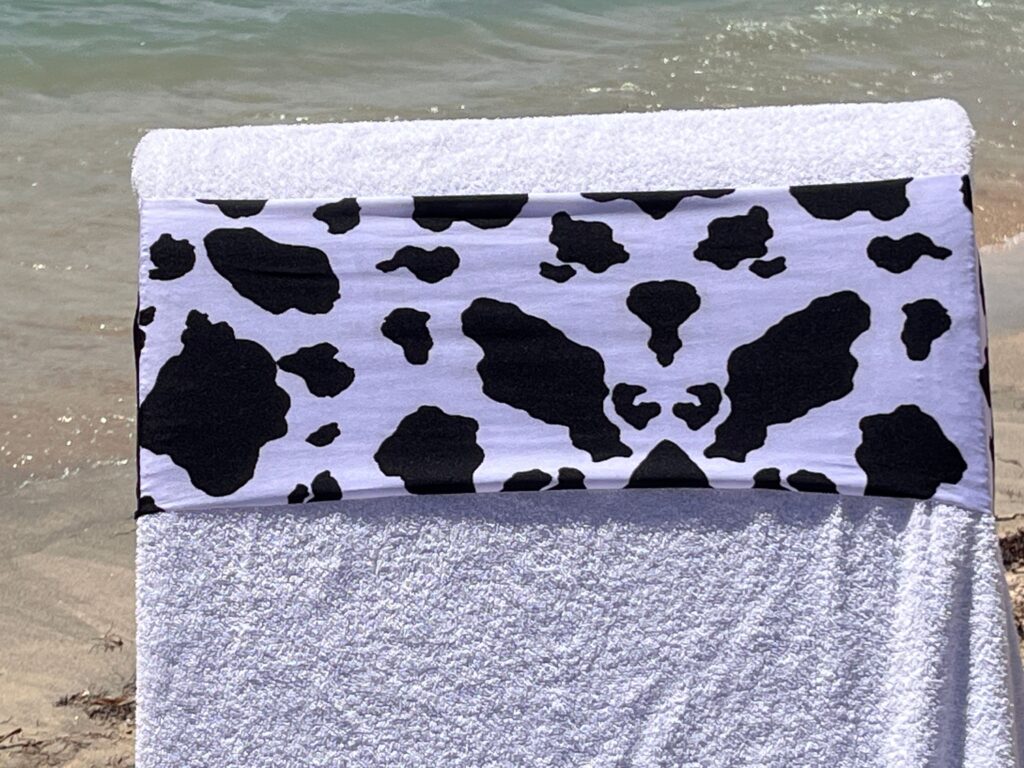 Friesian print design on a reusable tcboo sun lounger band