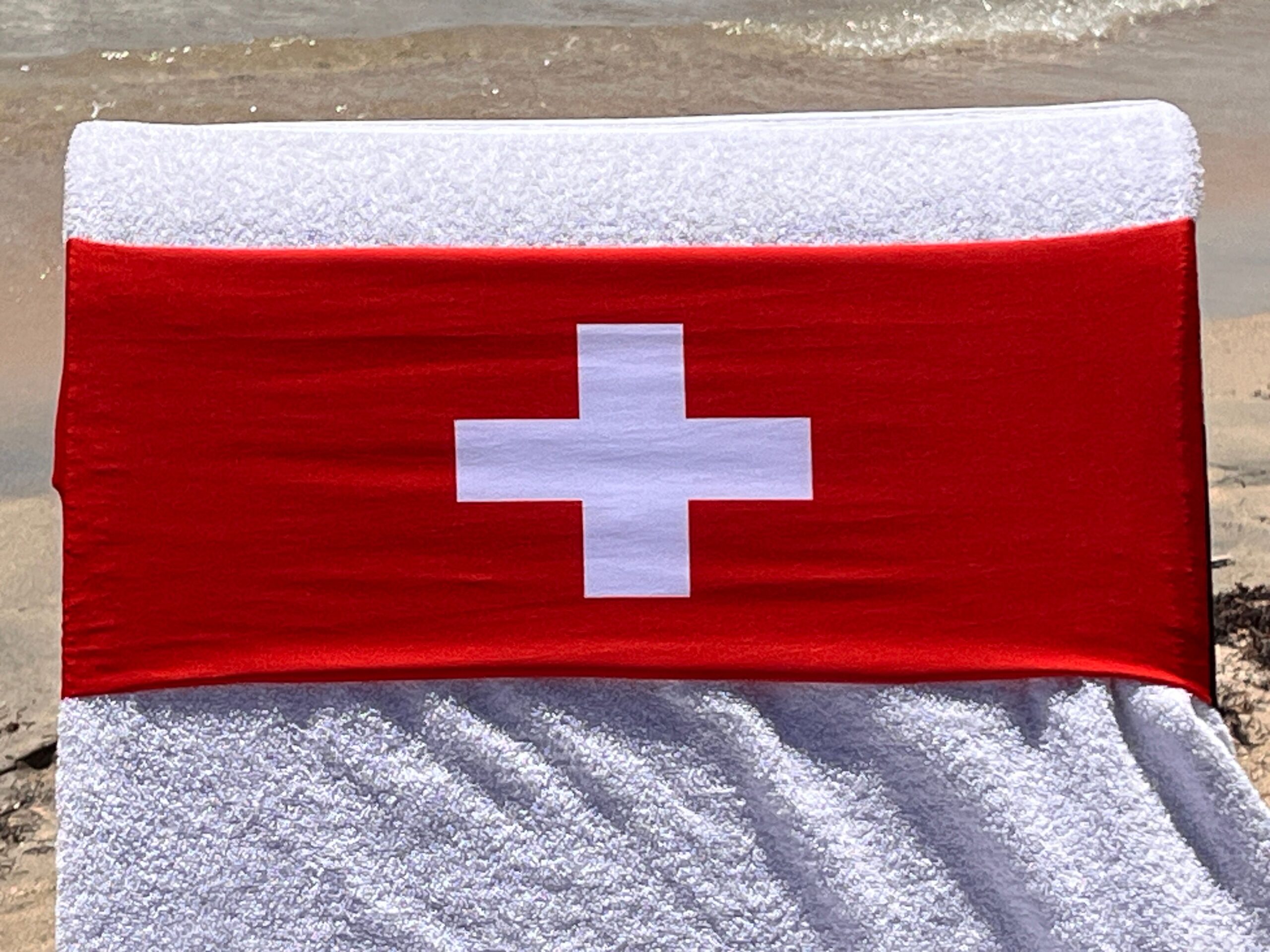 Switzerland flag design on a reusable tcboo sun lounger band