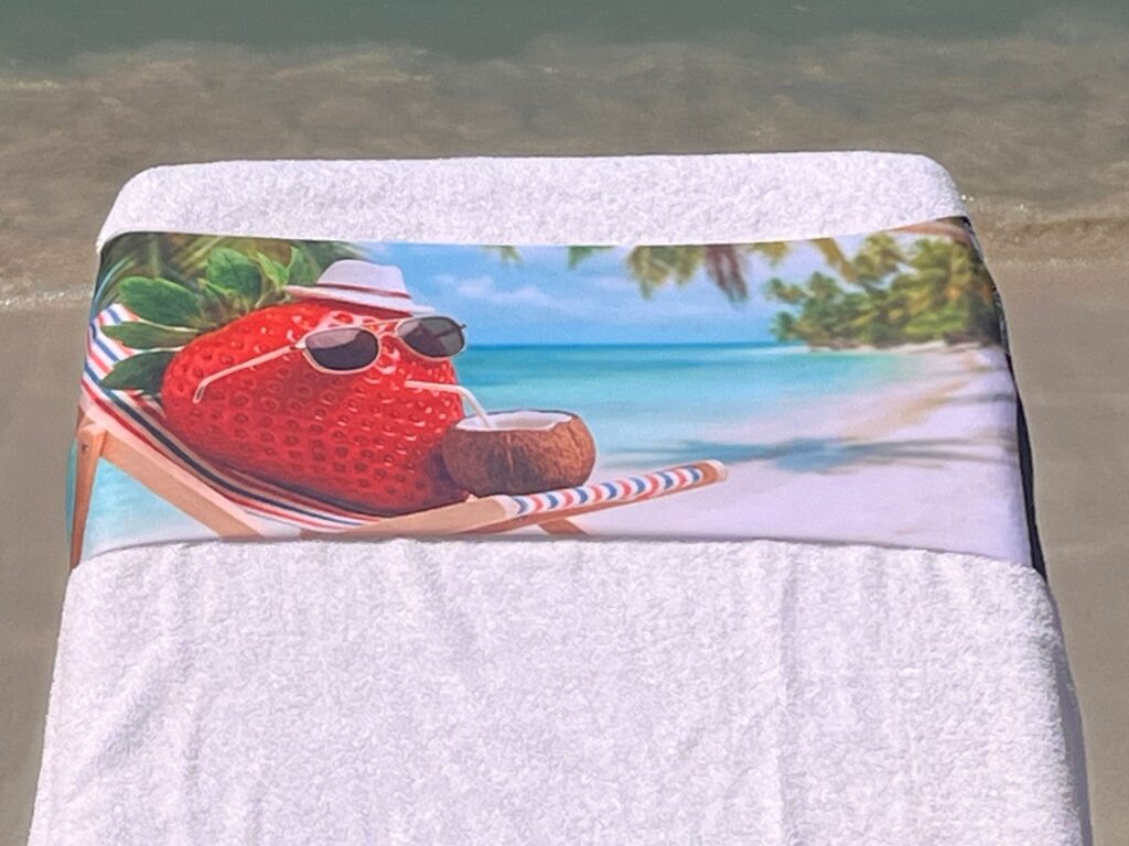 Strawberry Coconut design on a reusable tcboo sun lounger band