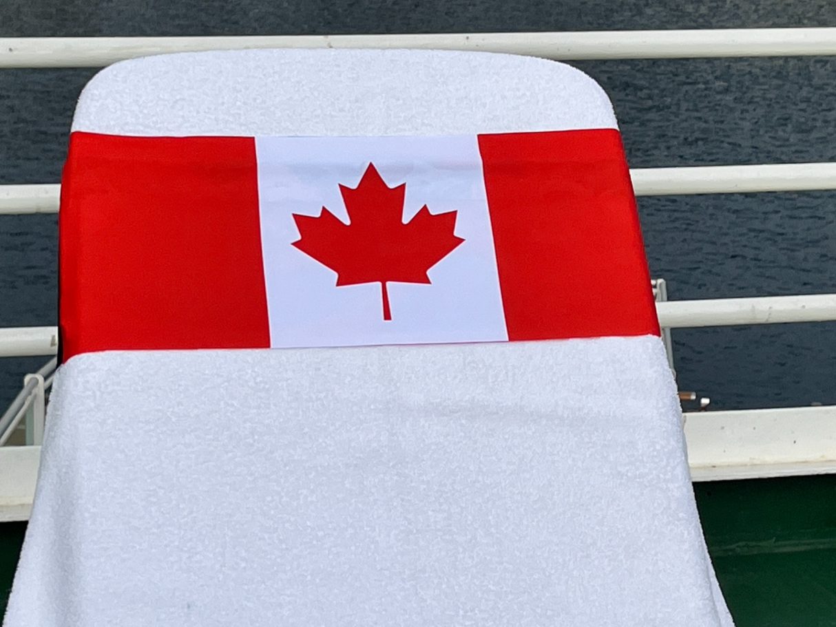 the Maple Leaf, Canada's National flag The Canadian flag holding a towel onto a sun lounger. see tcboo.shop